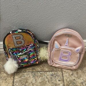 Justice Multicolor Sequin and Pink Metallic Unicorn Backpacks